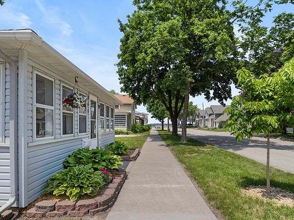 Front sidewalk with lake view
