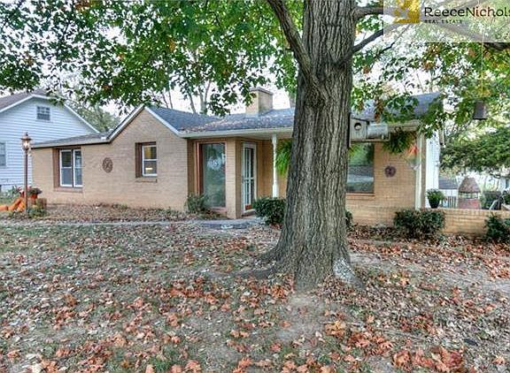 What a beautiful area to plant flowers in front of the home!  There is plenty of room on the porch to add a few rocking chairs.