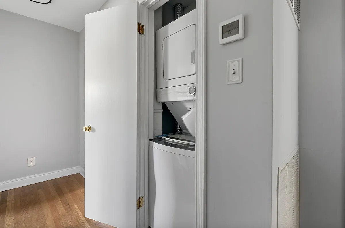 Common - stacked laundry washer & dryer in hallway on 2nd level - Three Chopt Rd