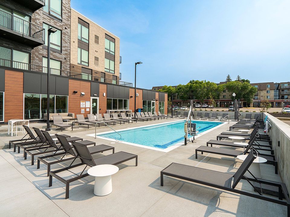 Relax poolside on comfortable lounge chairs, the perfect spot to enjoy sunny days.