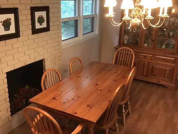 Dining area next to fireplace -- open to living room
