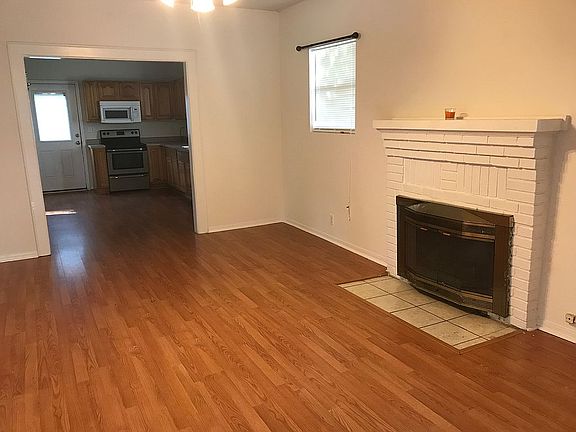 Wood floors, wood fireplace