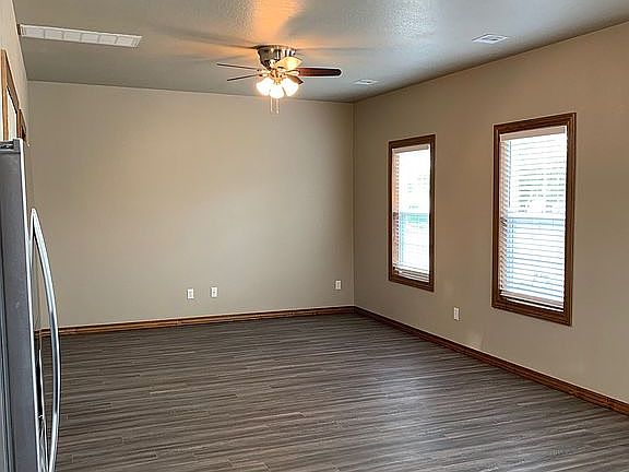 Open living, dining, kitchen