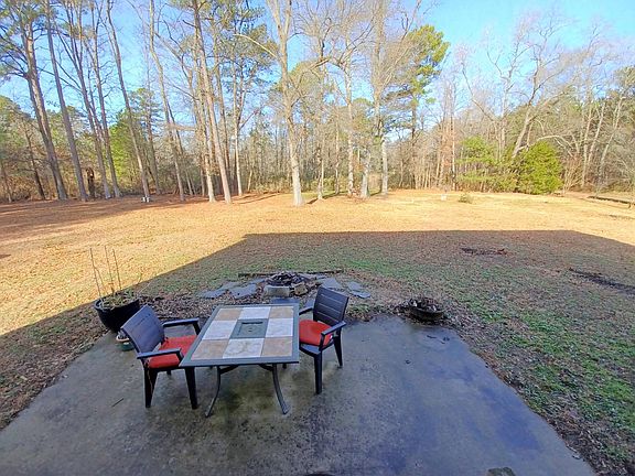 Patio and Backyard as seen from the Dining Room French doors