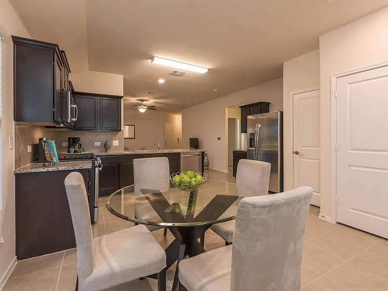 Dining area looking into kitchen