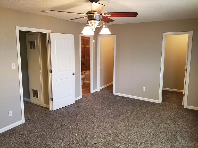 Primary Bedroom with En Suite Bathroom and 2 Walk-In Closets