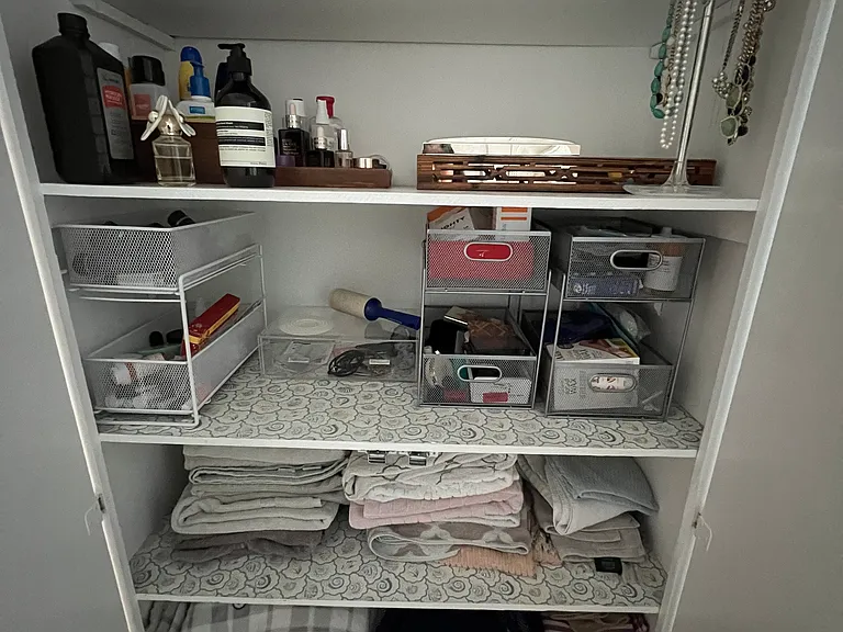 Current tenant _ linen and storage closet in hall outside of bathroom