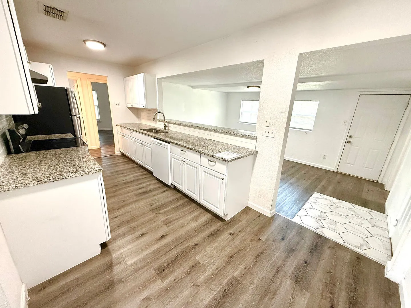 Charming 3-Bedroom Home with Fenced Backyard & Garage — Photo 4