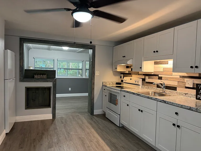 Kitchen with view to back bonus room