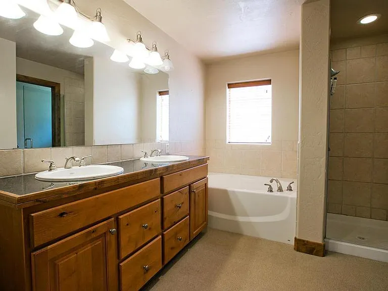 Master bath that includes two closets (one walk-in) and private toilet room