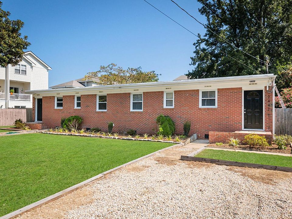 Duplex on left, large private drive room for 4 vehicles