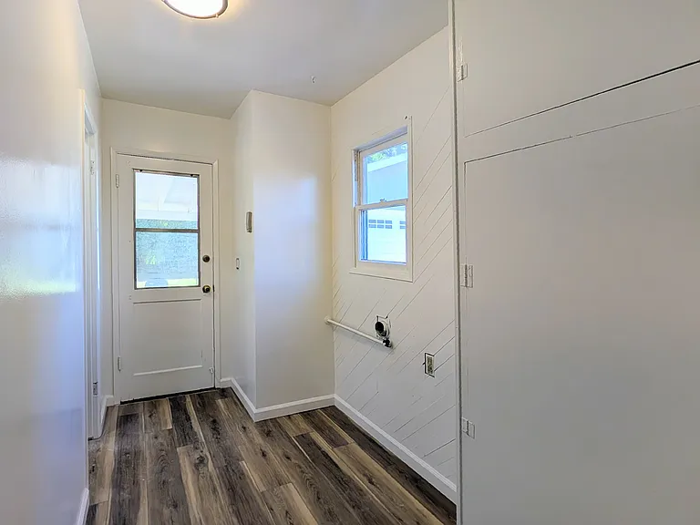 Laundry room and back door to covered patio