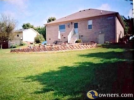 Rear View of House and Backyard