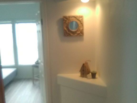 Hallway to extra bedroom & bath