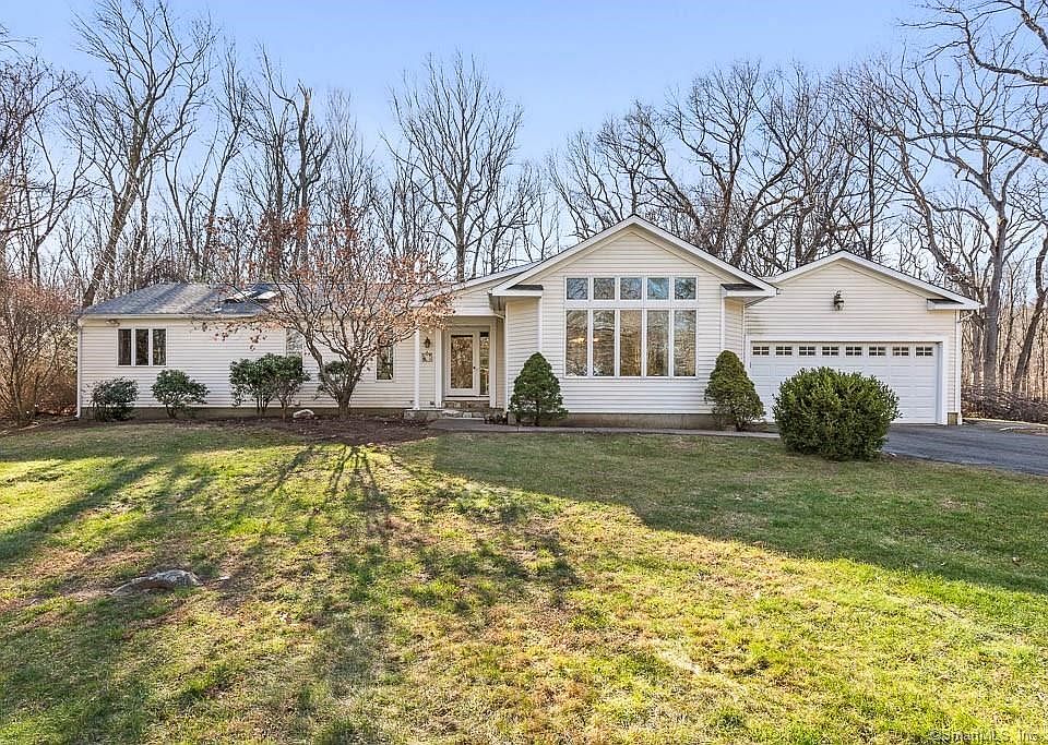 Front exterior picture of 16 Shady Lane in Woodbridge.