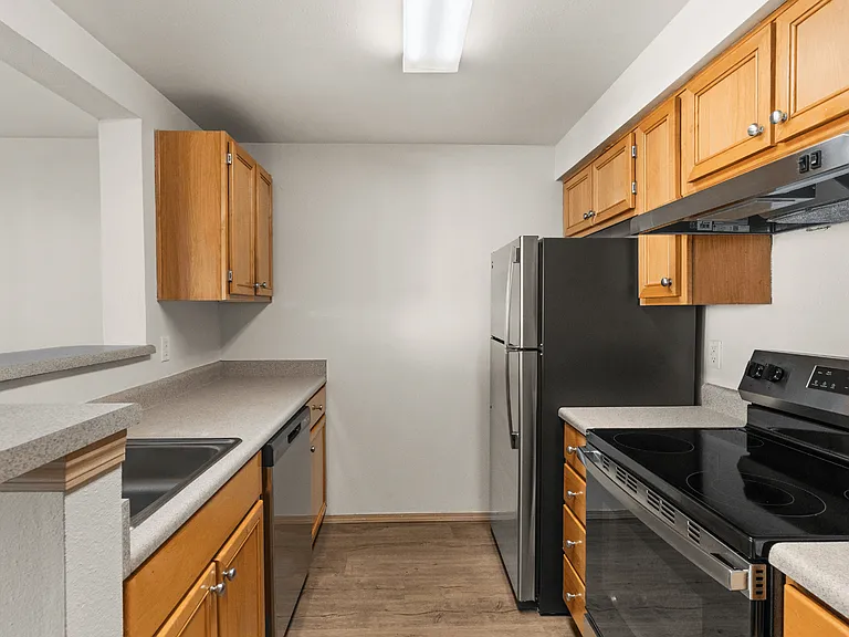 A functional kitchen designed for convenience and everyday cooking. A functional kitchen designed for convenience and everyday cooking.