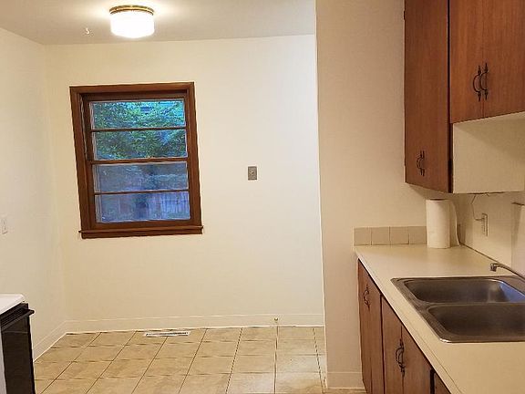 This is an eat in kitchen with room for a dining room table.