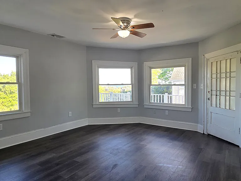 Primary bedroom suite has views of the Long Island Sound and door to balcony