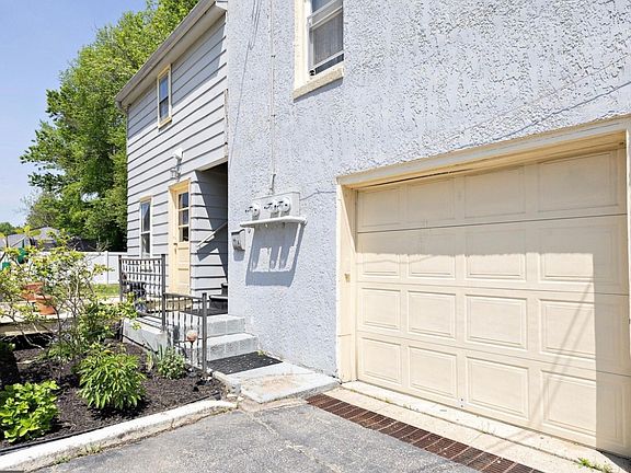 Stairs lead to upstairs apartment available.