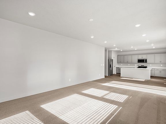 SLC_Pine_ 4241_Kitchen-Living-Area_B_113-High-Cheddar-Tooele-UT.jpg