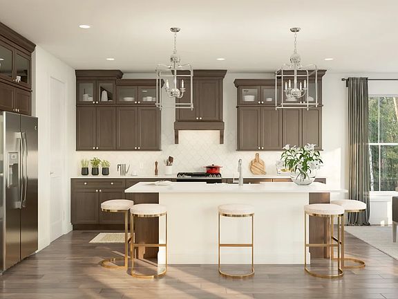 Kitchen with glass-front upper cabinets