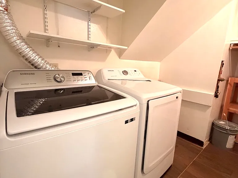 Laundry room in the basement floor - like new washer and dryer