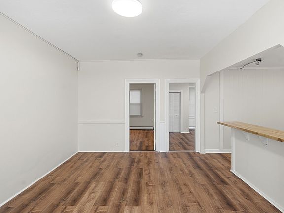 Main living room. Space for a tv, couch, and table.