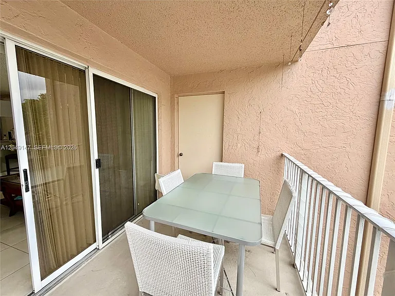 10521 SW 158th Ct #203 — Photo 16