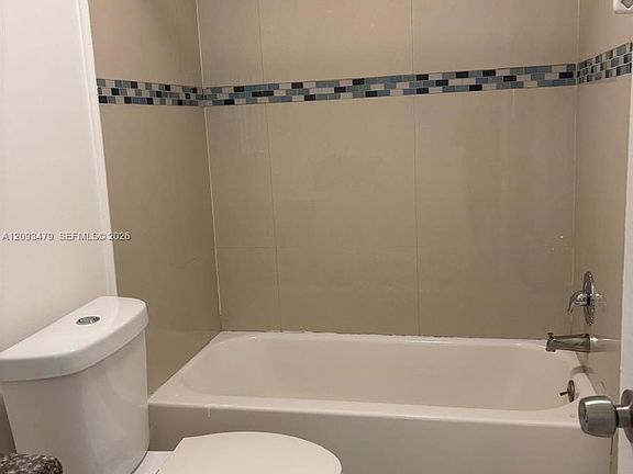5th image of 815 NE 213th Ter APT 4