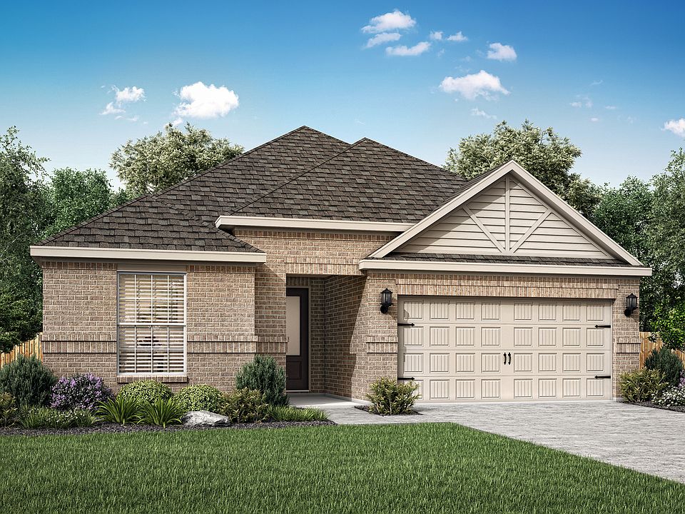 The Reed is a single story home with brick.