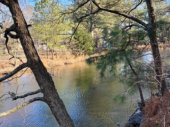 The lovely Assawoman Canal outside your back door at this special property.
