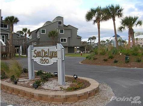 New sign and fresh landscaping.