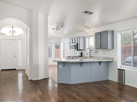 Great room looking at Kitchen/front door