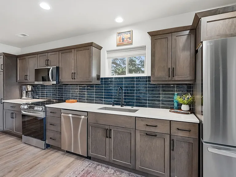 Beautiful custom cabinetry w/ a pantry too!