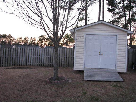 Stick built shed in back