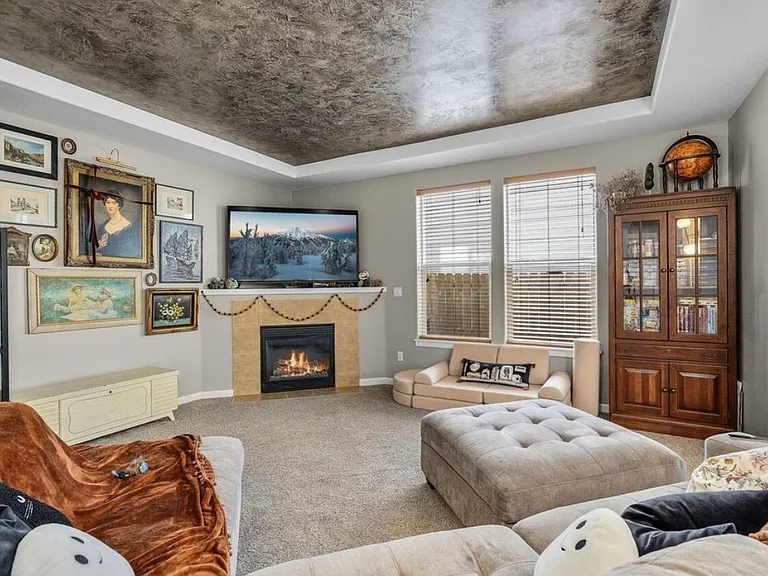 living room (fireplace included). what it looks like furnished!