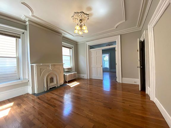 Bright center parlor gets southern exposure , even in winter.