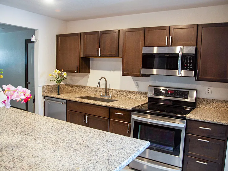 Kitchen equipped with coffee maker, utensils and basic supplies