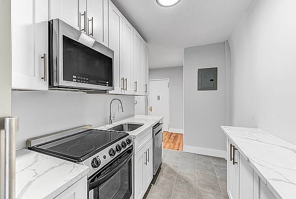 1st image of 301-303 E 4th St #2A