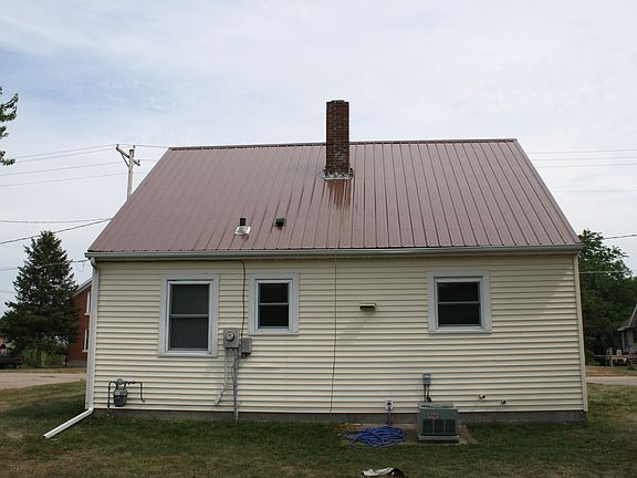 Back of house with new roof