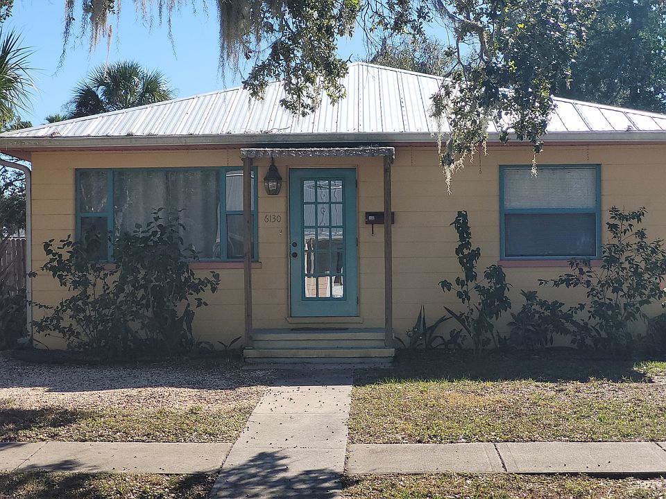 Home features wood floors.Metal roof