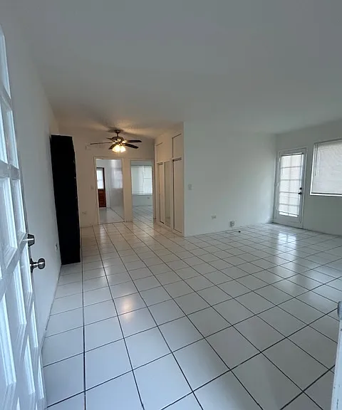 Huge living room with entrance to huge rooftop balcony