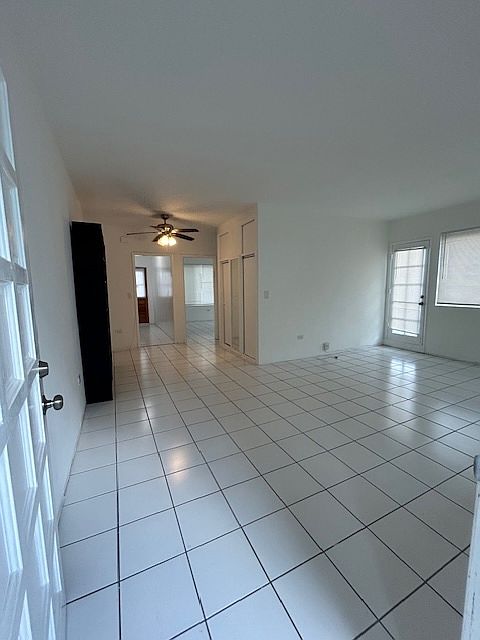 Huge living room with entrance to huge rooftop balcony
