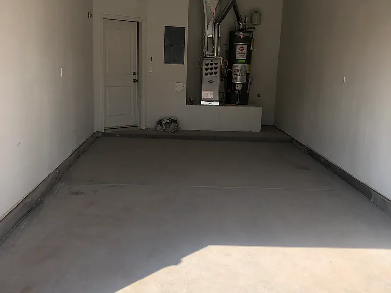 1-car finished garage with automatic and WIFI openers.