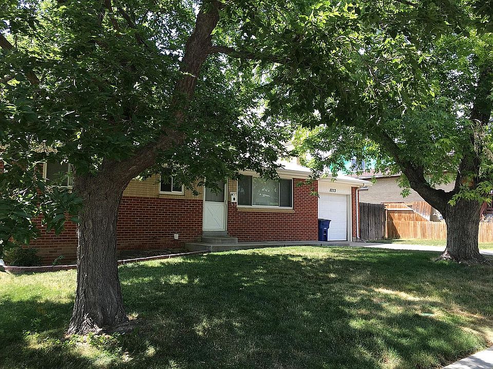 Front of the house with mature maple trees
