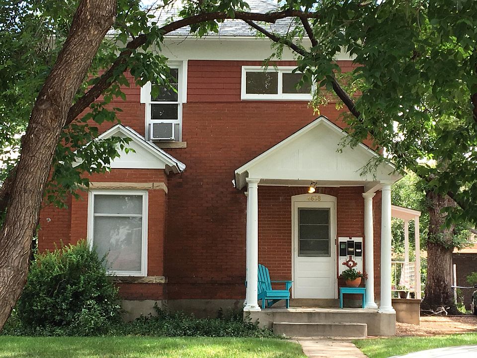 Front of house, upstairs windows are in this apartment