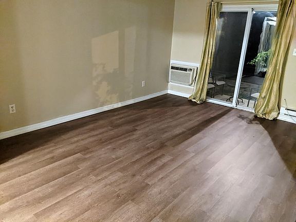 Living room with slide to patio.