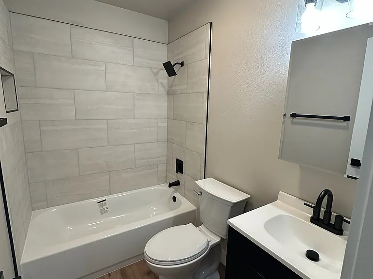 Beautiful and brand new full bath.