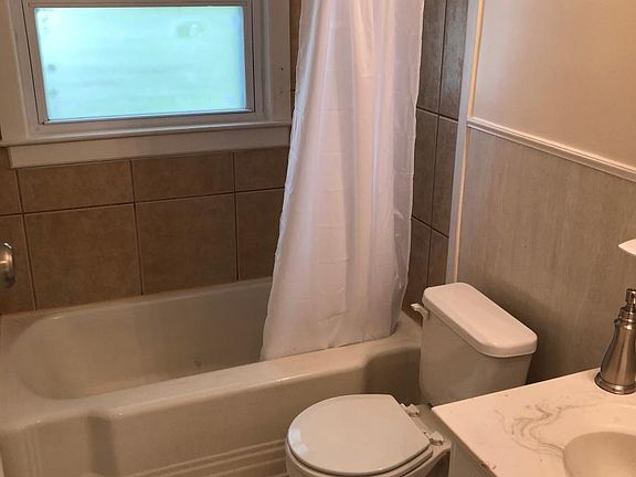 Bathroom with full tub