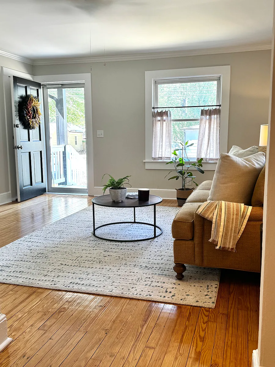 Welcoming entry into a warm, open living area. - 23 W Academy St